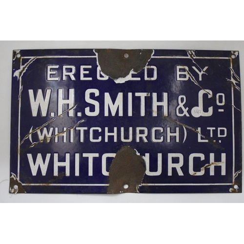 16 - A VINTAGE BLUE AND WHITE ENAMEL SIGN FOR W.H. SMITH & CO., 41 X 25.5 CM