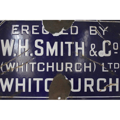 16 - A VINTAGE BLUE AND WHITE ENAMEL SIGN FOR W.H. SMITH & CO., 41 X 25.5 CM