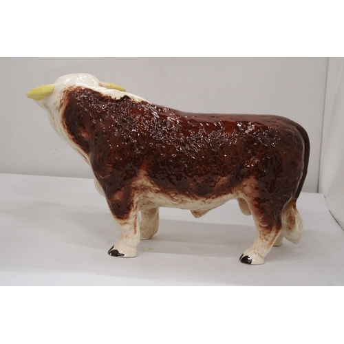 21 - A LARGE PORCELAIN BUTCHERS SHOP DISPLAY BULL WITH NOSE RING