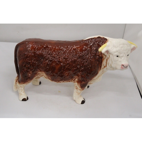 21 - A LARGE PORCELAIN BUTCHERS SHOP DISPLAY BULL WITH NOSE RING