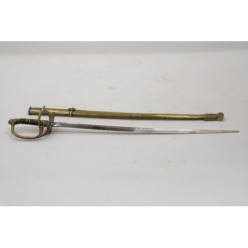 28 - A BRASS AND WHITE METAL ARTILLERY OFFICERS SWORD LETTER OPENER