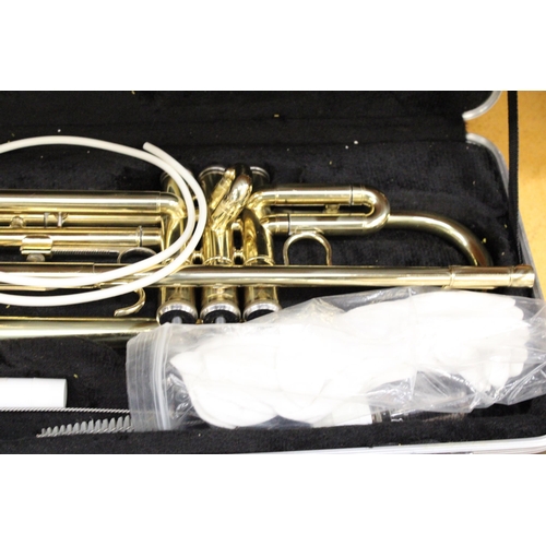 328 - A BOXED GEAR 4 MUSIC STUDENT TRUMPET WITH MOUTHPIECE AND ACCESSORIES