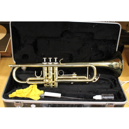 328 - A BOXED GEAR 4 MUSIC STUDENT TRUMPET WITH MOUTHPIECE AND ACCESSORIES