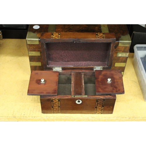 331 - AN INLAID MAHOGANY TEA CADDY AND A WALNUT WRITING SLOPE