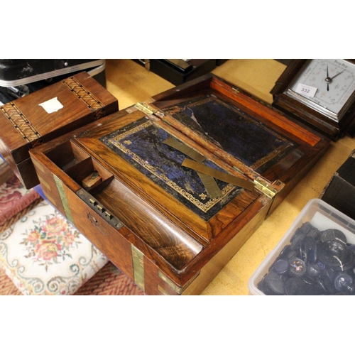 331 - AN INLAID MAHOGANY TEA CADDY AND A WALNUT WRITING SLOPE