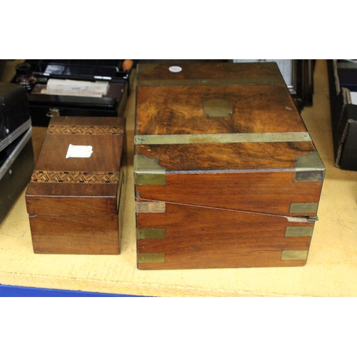 331 - AN INLAID MAHOGANY TEA CADDY AND A WALNUT WRITING SLOPE