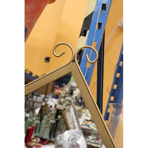 364 - A HEAVY GILT FRAMED MIRROR WITH SCROLL DECORATION,  33CM X 50CM