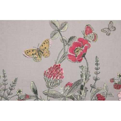 366 - A EMBROIDERED CANVAS OF WILD FLOWERS AND BUTTERFLIES TOGETHER WITH A METAL 