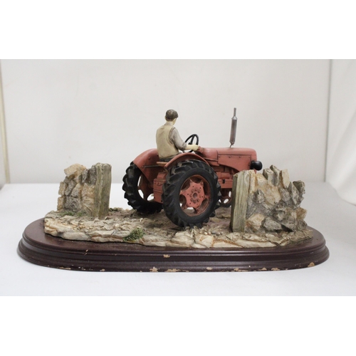 375 - A LARGE LEONARDO MODEL OF A TRACTOR AND COLLIE DOG AT HOME FARM ON A WOODEN PLINTH