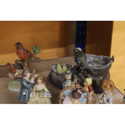 379 - A QUANTITY OF CERAMIC AND RESIN FIGURES TO INCLUDE CONTINENTAL STYLE, COLLIE DOGS, BIRDS, ETC