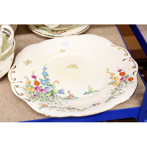 384 - A VINTAGE CROWN STAFFORDSHIRE TEASET IN PALE YELLOW WITH FLORAL DECORATION TO INCLUDE, A CAKE PLATE,... 