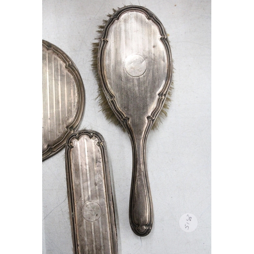 40 - A HALLMARKED SILVER DRESSING TABLE SET