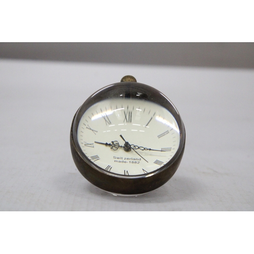 50 - A GLASS AND BRASS BUBBLE CLOCK