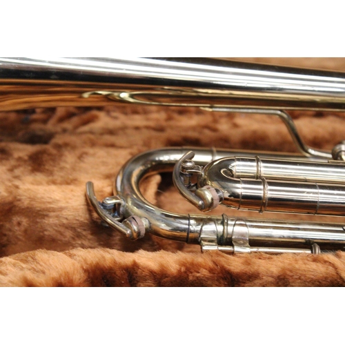 51 - A CASED BRASS TROMBONE BY CORTON