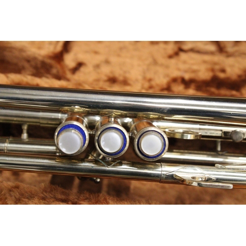 51 - A CASED BRASS TROMBONE BY CORTON