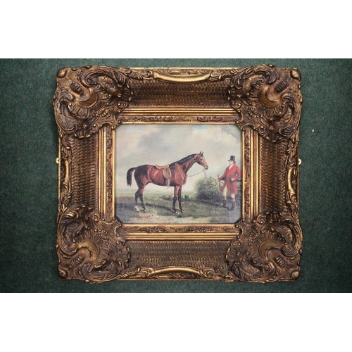 52 - A PRINT ON BOARD OF AN UNMOUNTED HUNTSMAN AND HORSE IN A HEAVY GILT FRAME - FRAMED BY CARVERS AND GI... 