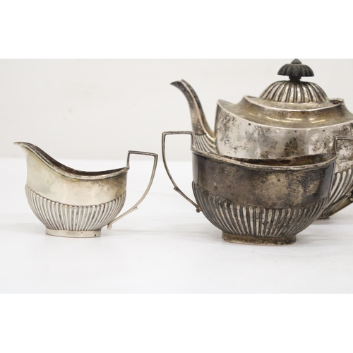 8 - A HALLMARKED BIRMINGHAM SILVER TEAPOT  SUGAR BOWL AND CREAMER STAMPED SWS & CO., TOGETHER WITH A HAL... 