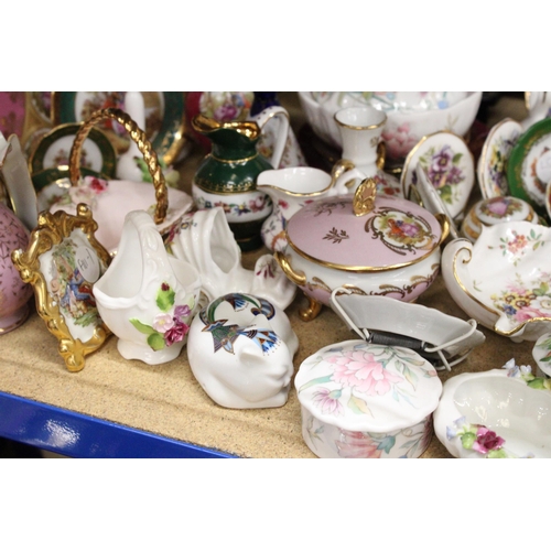 397 - A LARGE QUANTITY OF CHINA AND PORCELAIN MINIATURE PLATES, VASES, TRINKET BOXES, TO INCLUDE LIMOGES, ... 