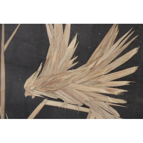 488 - A UNUSUAL FRAMED PICTURE OF A EXOTIC BIRD MADE WITH DRIED LEAVES - SIGNED  O J NESS 1964