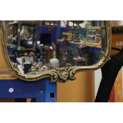 63 - A LARGE BAROQUE STYLE GILT MIRROR