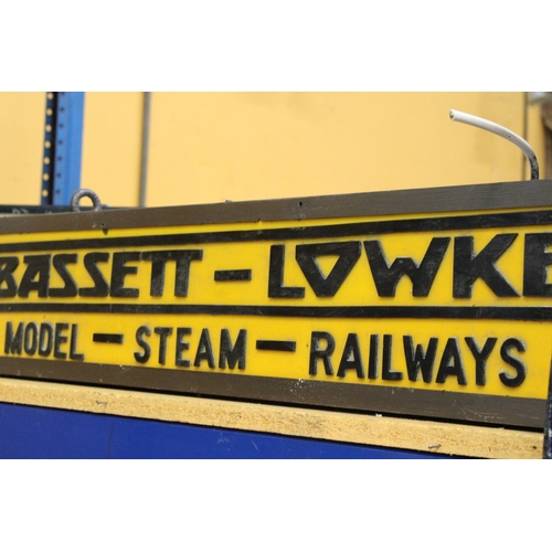 65 - A BASSETT-LOWKE MODEL-STEAM-RAILWAYS DOUBLE SIDED ILLUMINATED SIGN COMPLETE WITH HANGING BRACKET