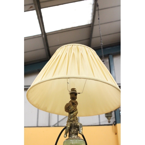 71 - AN ONYX TABLE LAMP WITH BRASS PUTTI DECORATION WITH SHADE