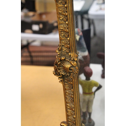 75 - AN ORNATE GILTWOOD MIRROR WITH CHERUB DETAIL