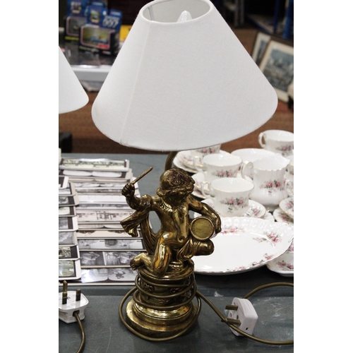 77 - A PAIR OF GILT FIGURAL COMPOSITE TABLE LAMPS