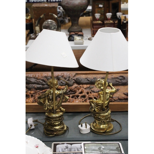 77 - A PAIR OF GILT FIGURAL COMPOSITE TABLE LAMPS