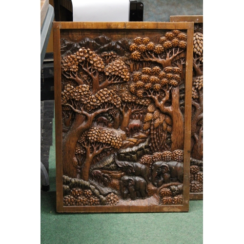 79 - TWO CARVED BALINESE WOODEN PANELS WITH THREE DIMENSIONAL WORK OF ART - APPROX 70 X 49.5 CM