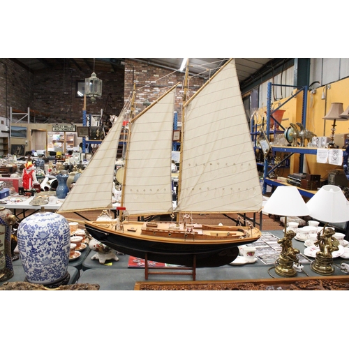 80 - A LARGE WOODEN MODEL OF A THREE MASTED SAILING SHIP