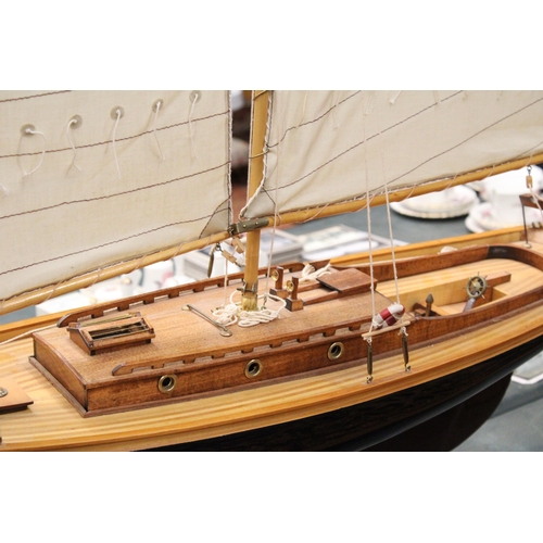 80 - A LARGE WOODEN MODEL OF A THREE MASTED SAILING SHIP