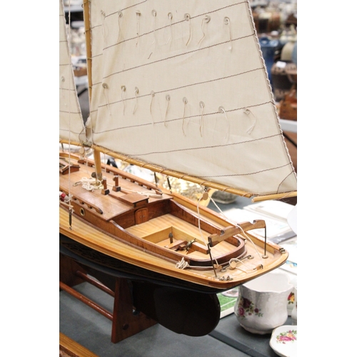 80 - A LARGE WOODEN MODEL OF A THREE MASTED SAILING SHIP