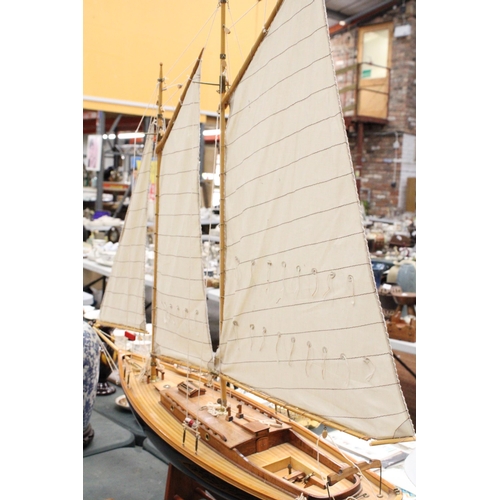 80 - A LARGE WOODEN MODEL OF A THREE MASTED SAILING SHIP