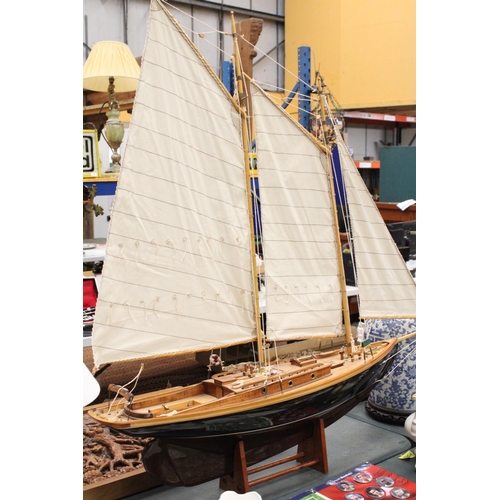 80 - A LARGE WOODEN MODEL OF A THREE MASTED SAILING SHIP