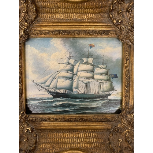 81 - A VINTAGE PRINT ON BOARD OF A CLIPPER/SAILING SHIP IN FULL SAIL IN A HIGHLY ORNATE GILDED FRAME - FR... 