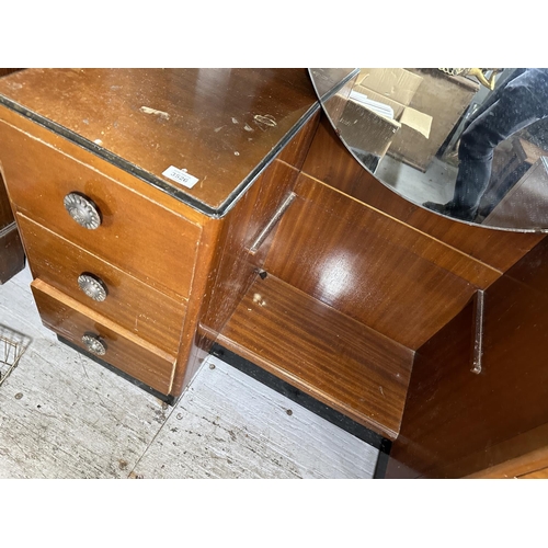 3526 - AN ART DECO STYLE PEDESTAL DRESSING TABLE WITH SIX DRAWERS AND A LARGE ROUND MIRROR