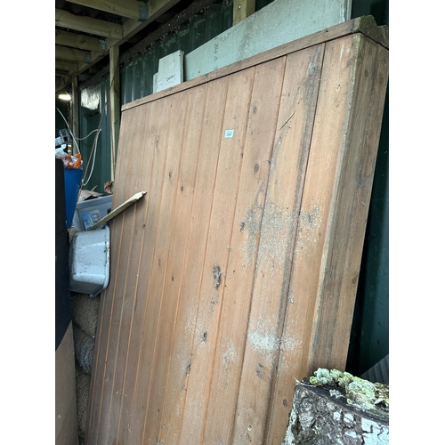 3547 - TWO HEAVY WOODEN PANNELED GATES (130CM WIDE EACH)