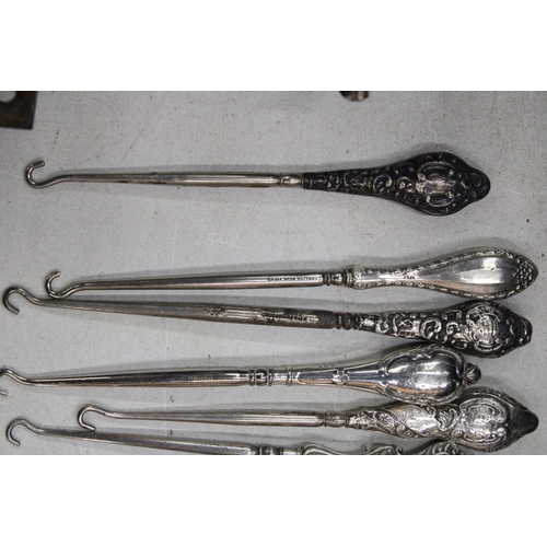 6 - A COLLECTION OF 8 SILVER HALLMARKED BUTTON HOOKS