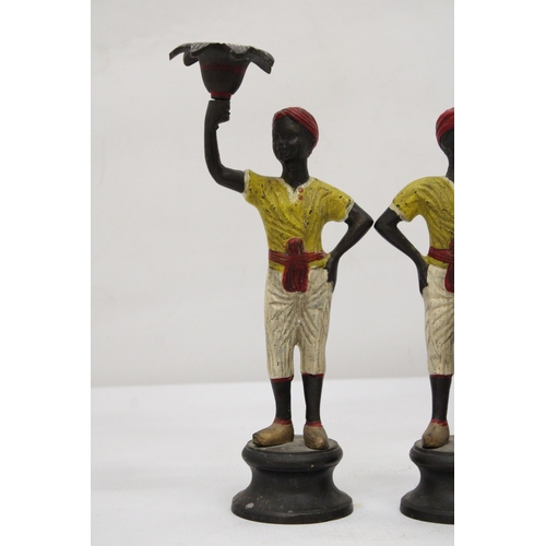 12 - A PAIR OF COLD PAINTED BLACKAMOOR CANDLESTICKS