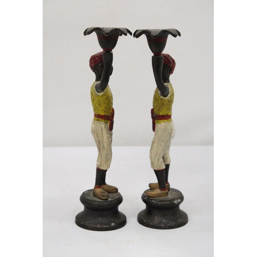 12 - A PAIR OF COLD PAINTED BLACKAMOOR CANDLESTICKS