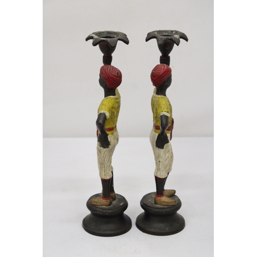 12 - A PAIR OF COLD PAINTED BLACKAMOOR CANDLESTICKS