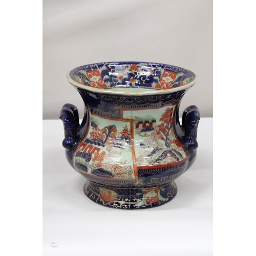 35 - AN ANTIQUE VICTORIA WARE IRONSTONE POTTERY PLANTER WITH AN ORIENTAL SCENE