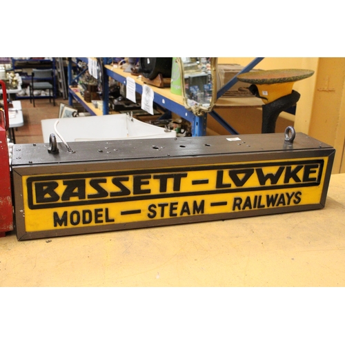 65 - A BASSETT-LOWKE MODEL-STEAM-RAILWAYS DOUBLE SIDED ILLUMINATED SIGN COMPLETE WITH HANGING BRACKET