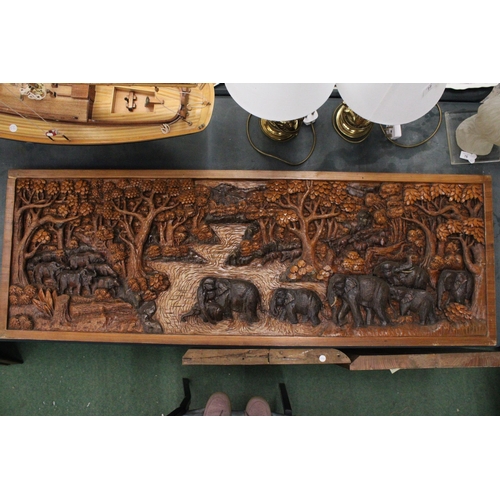 78 - A CARVED BALINESE WOODEN PANEL WITH THREE DIMENSIONAL WORK OF ART - APPROX 142 X 49 CM