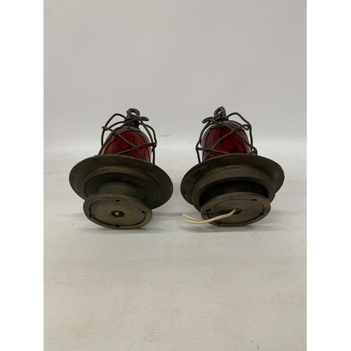 87 - A PAIR OF COASTAL NAUTICAL MARINE LIGHTS IN A BRASS CAGE