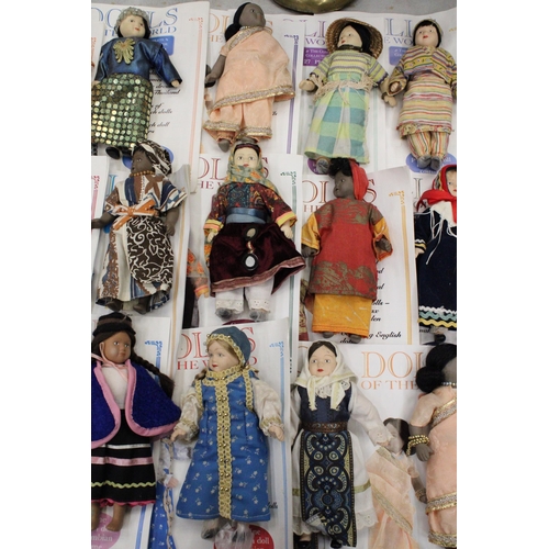 242 - A COLLECTION OF 21 PORCELAIN 'DOLLS OF THE WORLD', EACH WITH COLLECTORS MAGAZINES, TO INCLUDE INDIA,... 