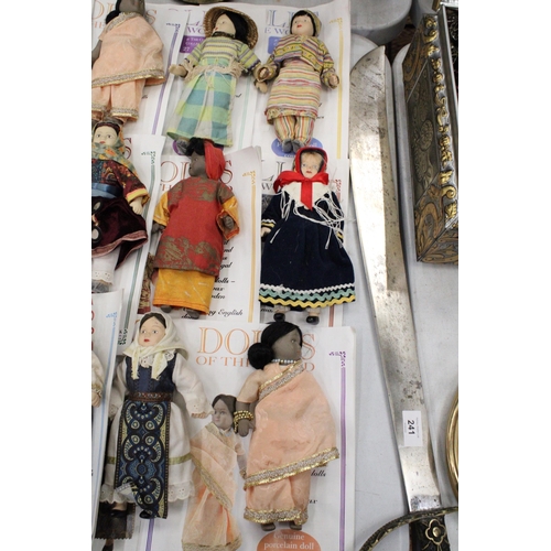 242 - A COLLECTION OF 21 PORCELAIN 'DOLLS OF THE WORLD', EACH WITH COLLECTORS MAGAZINES, TO INCLUDE INDIA,... 