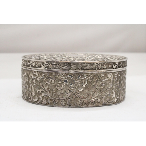 247 - A LARGE VINTAGE SILVER PLATED OVAL REPOUSSE JEWELLERY CASKET