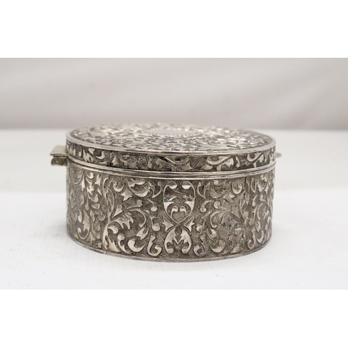 247 - A LARGE VINTAGE SILVER PLATED OVAL REPOUSSE JEWELLERY CASKET